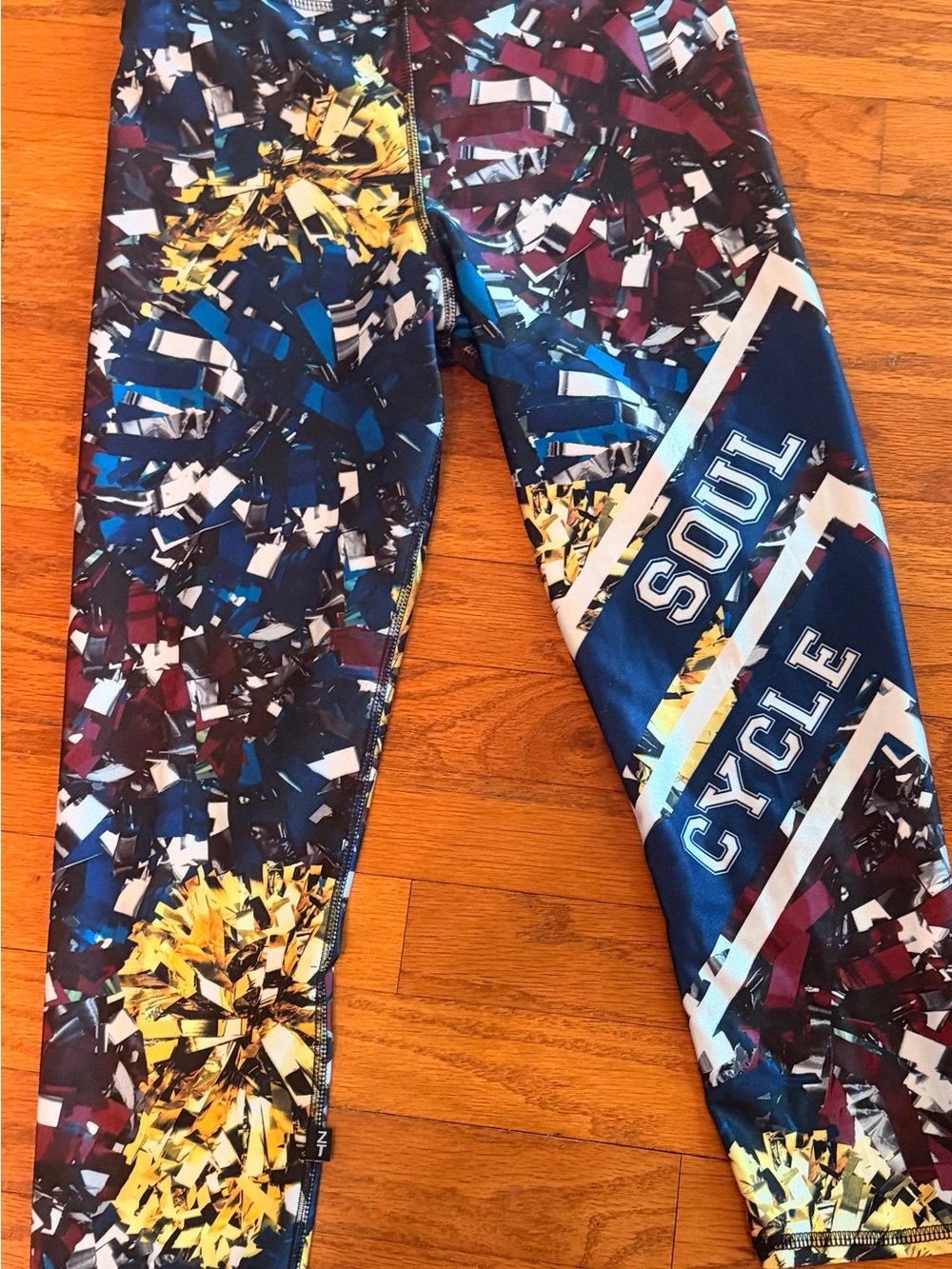 Zara Terez Multicolor Confetti Print Leggings with Navy Panels.